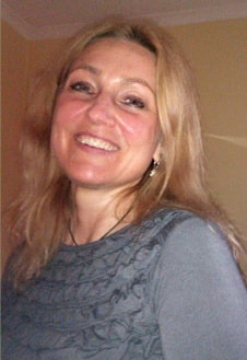 A warm, professional portrait of Naturopath Karen Hogan ND, an experienced natural medicine practitioner with over 30 years of clinical expertise.